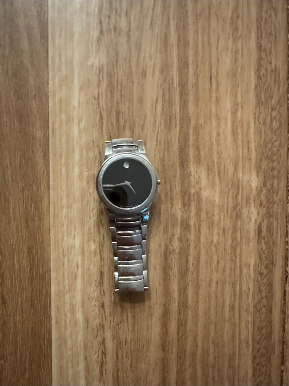 Movado Silver Bracelet Watch with Black Dial